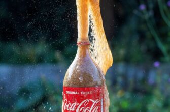 Coca-cola-splashes-out-of-bottle-after-adding-Mentos-to-carbonated-liquid