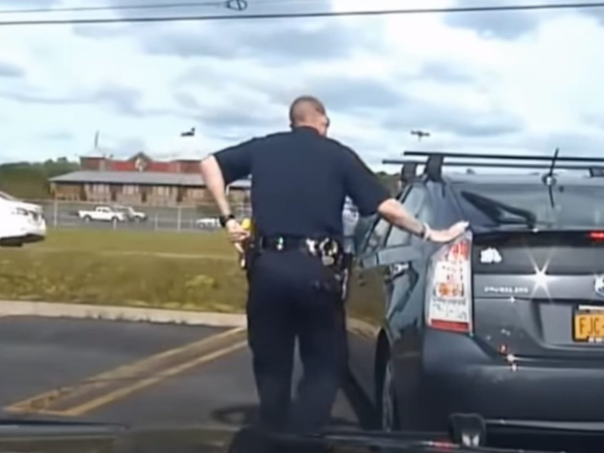 Why do police officers touch the back of the car: main illustration